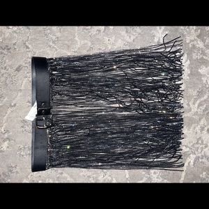 A belted cover-up looks good on top of bathing suits shorts